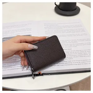 Billetera tarjetero de cuero marrón oscuro con cremallera para hombres y mujeres.