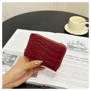 Red crocodile pattern PU leather zipper card holder coin purse compact minimalist wallet design.