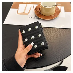Black short embroidered wallet for women, cute floral zip card holder and cash pouch.