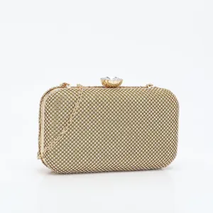 Stunning gold rhinestone evening clutch bag featuring sparkling crystals and metal chain strap.