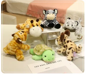 Detail view of cute animal plush toys, including tiger and turtle, soft magnetic doll set.
