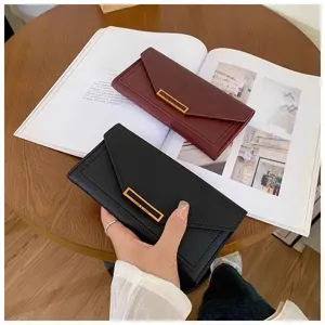 Detail view of stylish women's long PU leather wallet with metallic clasp and multi-card slots.