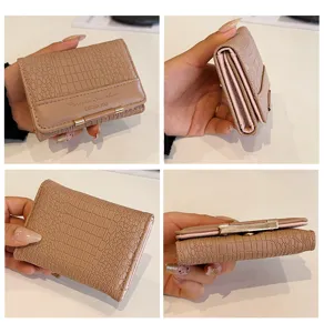 Damen kurze PU Leder Geldbörse mit Kroko Muster, kompaktem Dreifach Design und stabilem Schloss.