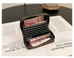 Compact brown leather zipper card holder with multi slots for daily coin and card storage.