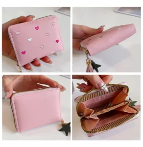 Pink PU leather short wallet for women, cute embroidered hearts design with star charm.