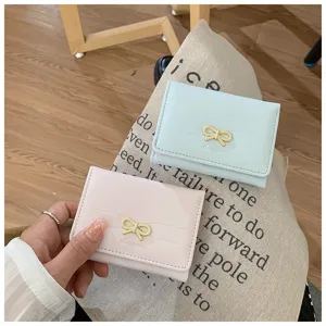Cute bow short wallet for women, minimalist PU leather card holder and coin purse daily use.