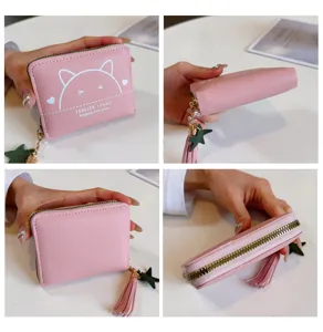 Pink PU leather short wallet detail, compact zipper coin purse with cute cat print and tassel charm.