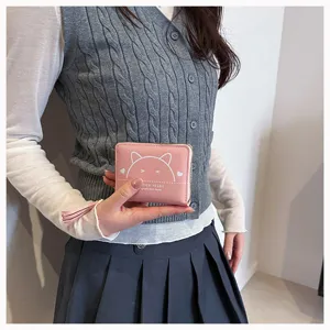 Minimalist women short coin purse cute zipper tassel PU leather card holder pink wallet.