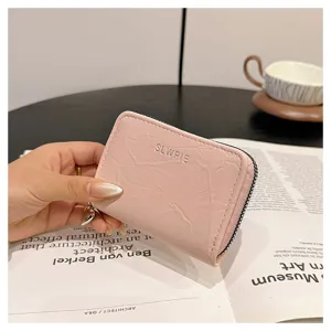 Minimalist pink zipper coin purse and card holder for women, compact daily wallet case.