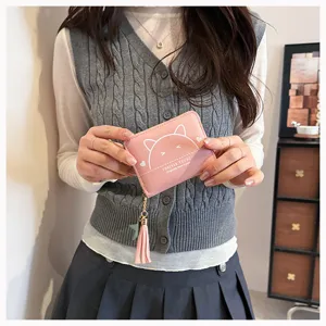 Cute pink PU leather short wallet for women with cute cat graphic and lovely tassel zipper.