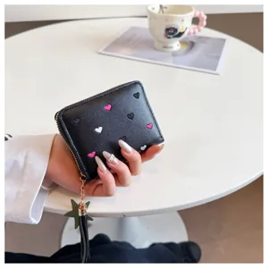 Black PU leather short women wallet with cute embroidered hearts and star tassel pendant.