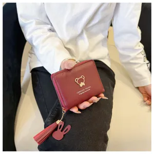 Women short PU leather wallet with cute bear tassel coin purse zipper card holder red.