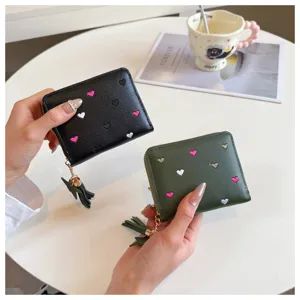 Short PU leather wallet with cute heart embroidery and tassel charm, women coin purse card holder.