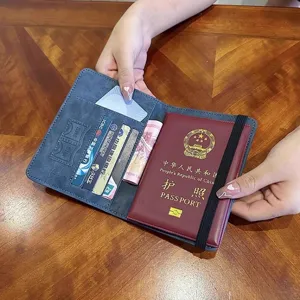 Cartera de pasaporte de viaje RFID seguro, organizador multifuncional para tarjetas y dinero.