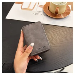 Minimalist grey leather card holder wallet with multi slots and zipper closure for daily use.