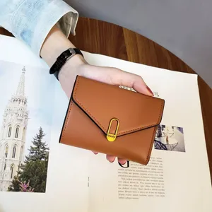 Brown short folding envelope wallet with elegant metal clasp design for women daily use