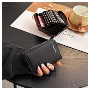Black leather card holder wallet with multiple accordion slots and secure zipper closure.
