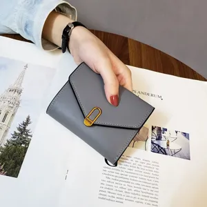 Grey short women wallet folding card holder with stylish metal lock design for daily use