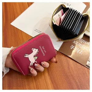 Porte-cartes accordéon compact avec fermeture éclair et joli imprimé de dessin animé.