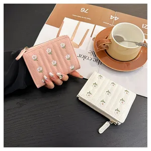 Floral embroidered short wallet for women, cute folding card holder with zipper coin pocket.