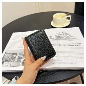 Elegant black crocodile pattern zipper card holder, compact coin purse for women.