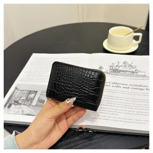 Women stylish black crocodile pattern zipper card holder coin purse compact daily wallet accessory.