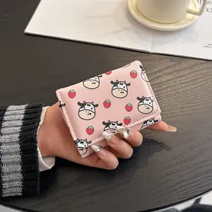 Pink trifold short wallet for women with cute cow strawberry print mini card coin purse.