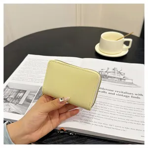 Women solid color mini zipper card holder coin purse portable PU leather wallet organizer.
