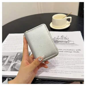 Silver leather card holder detail, compact zip coin purse with multi-slot wallet.