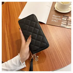 Black quilted long wallet for women, chic zip clutch purse with handy wrist strap.
