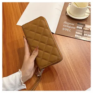 Chic quilted long wallet for women with zipper closure and wrist strap, premium brown faux leather finish.
