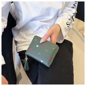 Dark green PU leather short wallet with cute heart embroidery and chic tassel pendant.