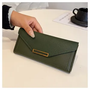 Green long wallet for women, elegant faux leather envelope design with card slots and clasp.