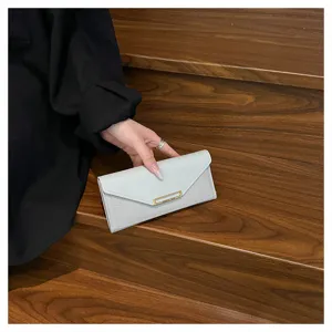 Women's long wallet minimalist slim envelope PU leather purse with multiple card slots.