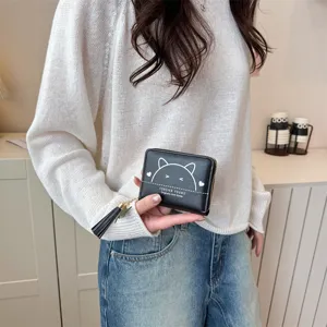Women's short coin purse PU leather zipper card wallet with cat design and tassel charm.
