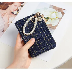 Elegant tweed coin purse with pearl strap for women, stylish short wallet and card holder.
