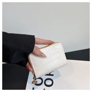 White crocodile pattern leather card holder detail, zipper coin purse with compact card slots.