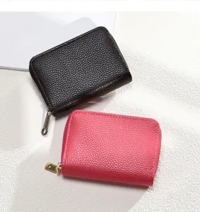 Porte-cartes compact en cuir avec fermeture éclair, design multi-fentes pour cartes et ID.