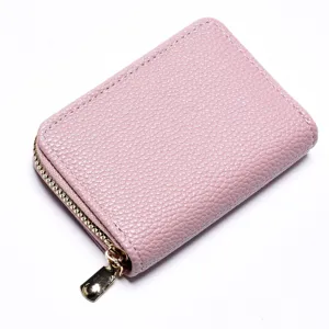Porte-cartes zippé en cuir rose avec plusieurs fentes pour cartes et permis de conduire.