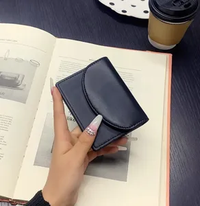 Minimalist PU leather short wallet card holder, portable multi-functional coin purse detail.