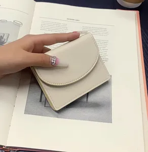 Minimalist solid color PU leather short wallet card holder daily portable change purse detail.