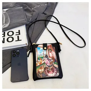 Black crossbody phone bag for women with cute anime illustration flap, stylish sling bag.