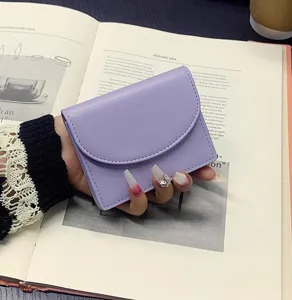 Minimalist solid color PU leather short card holder, elegant purple mini wallet detail view.