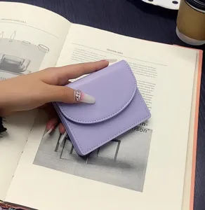Minimalist solid color PU leather short wallet card holder detail view, elegant purple style.