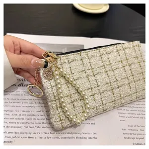 Chic tweed woven short wallet with pearl wrist strap and zipper closure for women.