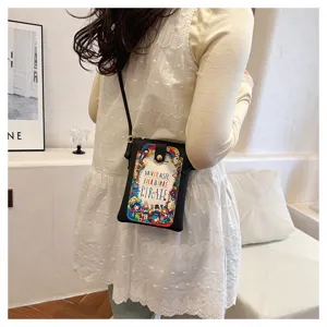 Detailed view of women crossbody phone bag, casual cute mini shoulder bag with colorful print.