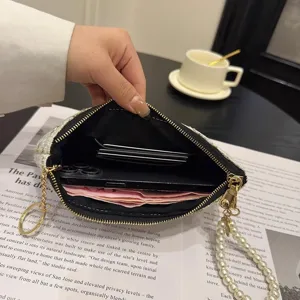 Women's tweed woven short zipper clutch wallet with pearl wrist strap and card slots.