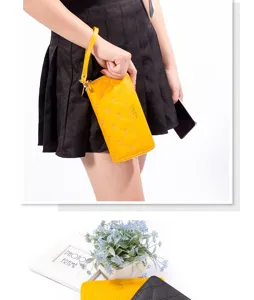 Portafoglio donna lungo in ecopelle gialla pochette con zip e cinturino da polso elegante