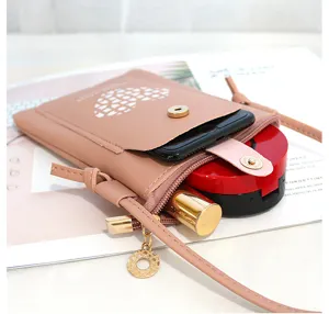 Mini PU leather crossbody phone bag for women, cute pink shoulder pouch with card slots.