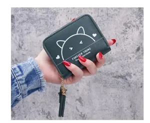 Close-up detail of dark green cute cat print short zipper wallet purse with tassel pendant.